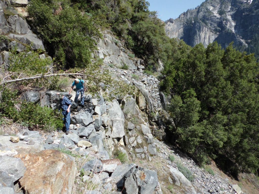 Charlie and Oleg navigating through this washed out section: