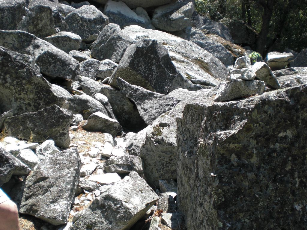 Rock cairns stacked on the boulders may or may not be misleading in this area: