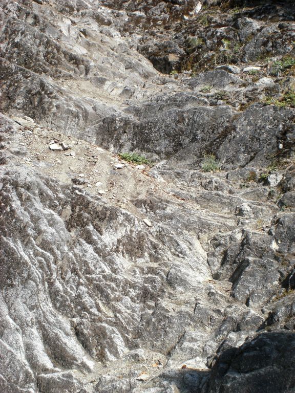 A closer look reveals that the climb itself would not be so bad if it weren't for all the loose gravel.  This is not an area where you would want to slip and begin sliding back down: