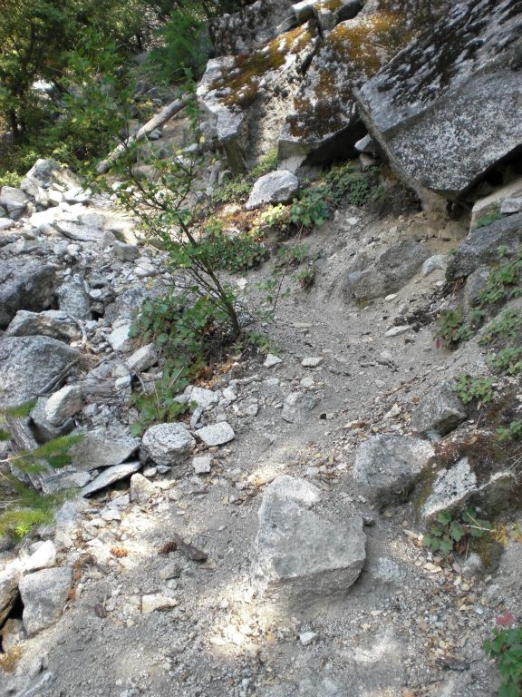 Passing by an area where giant slabs of granite have broken off: